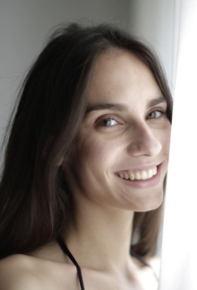 A Peak Functional Health client smiling during a session