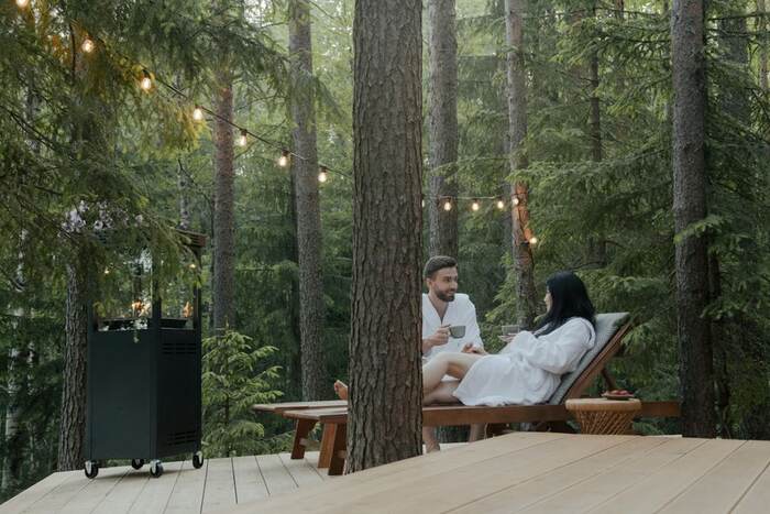 A couple relaxing outdoors at a wellness retreat